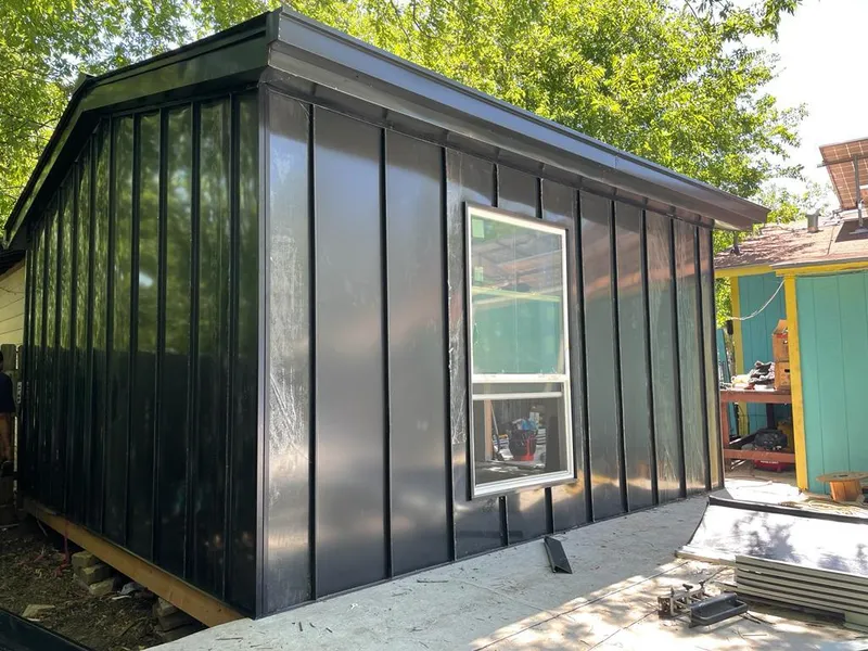 Black standing seam metal wall panels for Metal Roof Installation in Pensacola