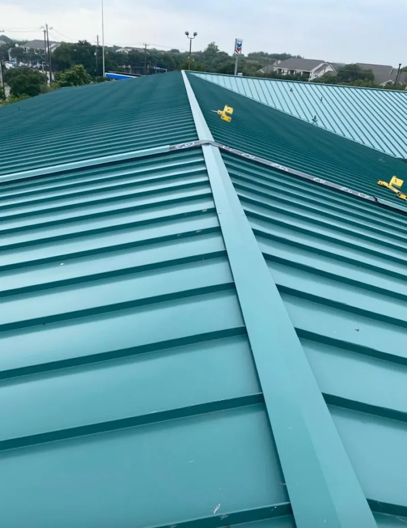 Green commercial metal roof ridge and valley for Metal Roof Repair in Pensacola